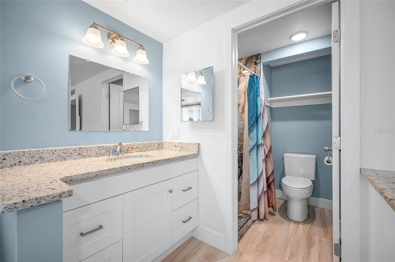 2111 HEASLEY ROAD, Englewood, FL 34223 Ensuite primary bathroom with GRANITE COUNTER TOP