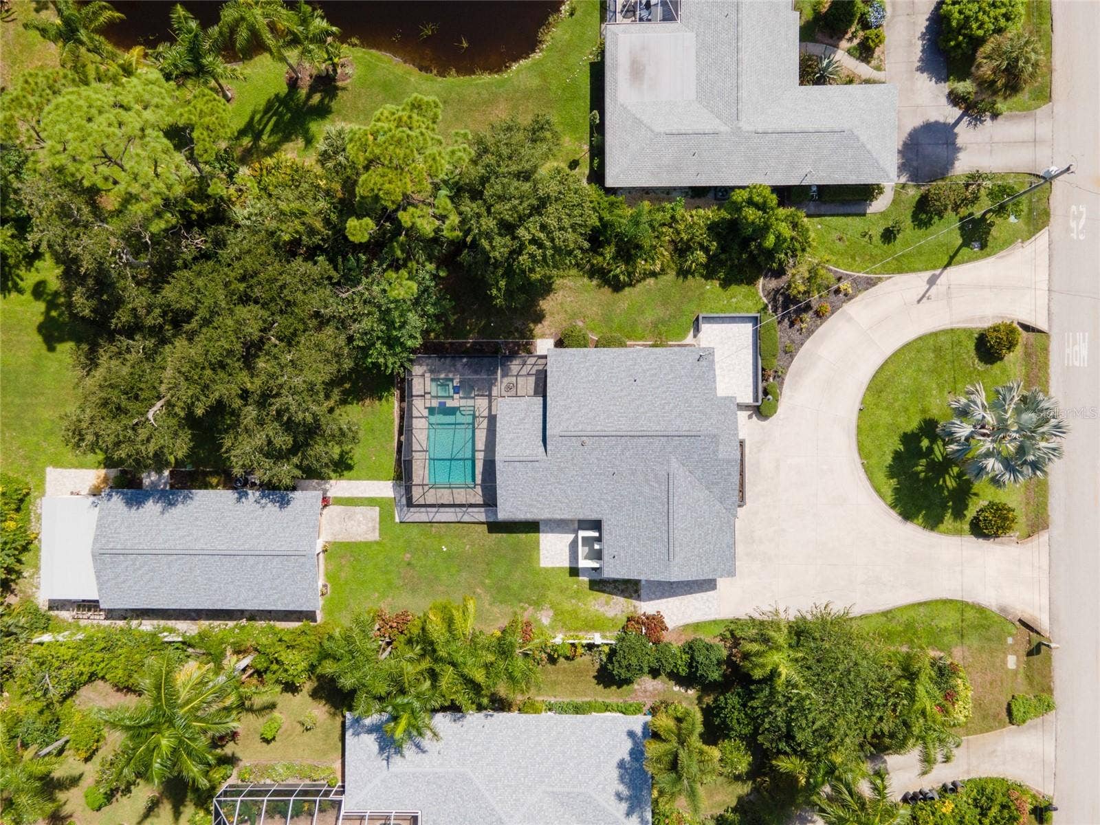 2111 HEASLEY ROAD, Englewood, FL 34223 Sitting on nearly 3 quarters of an acre