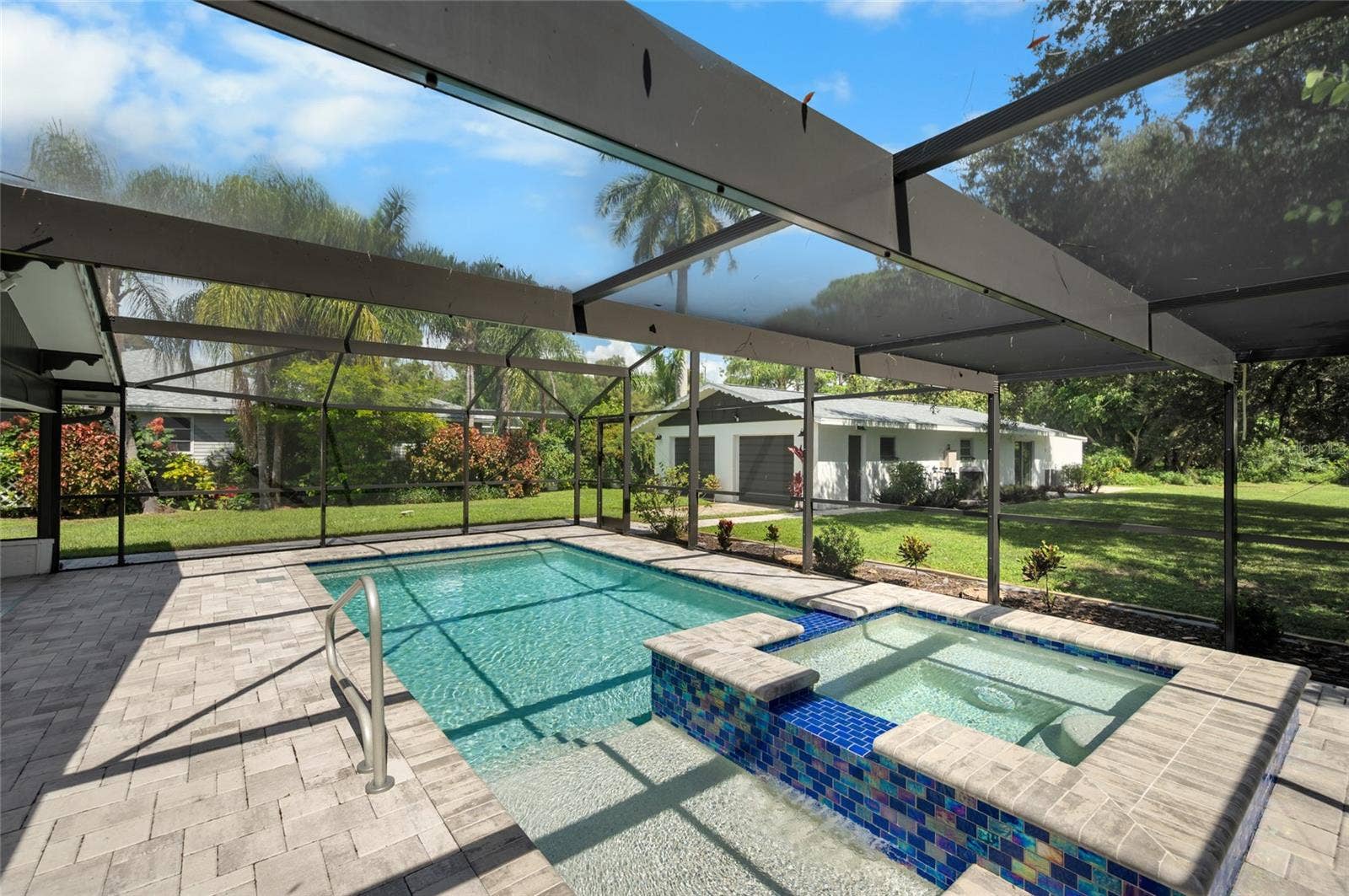 2111 HEASLEY ROAD, Englewood, FL 34223 Sparkling heated spa and pool