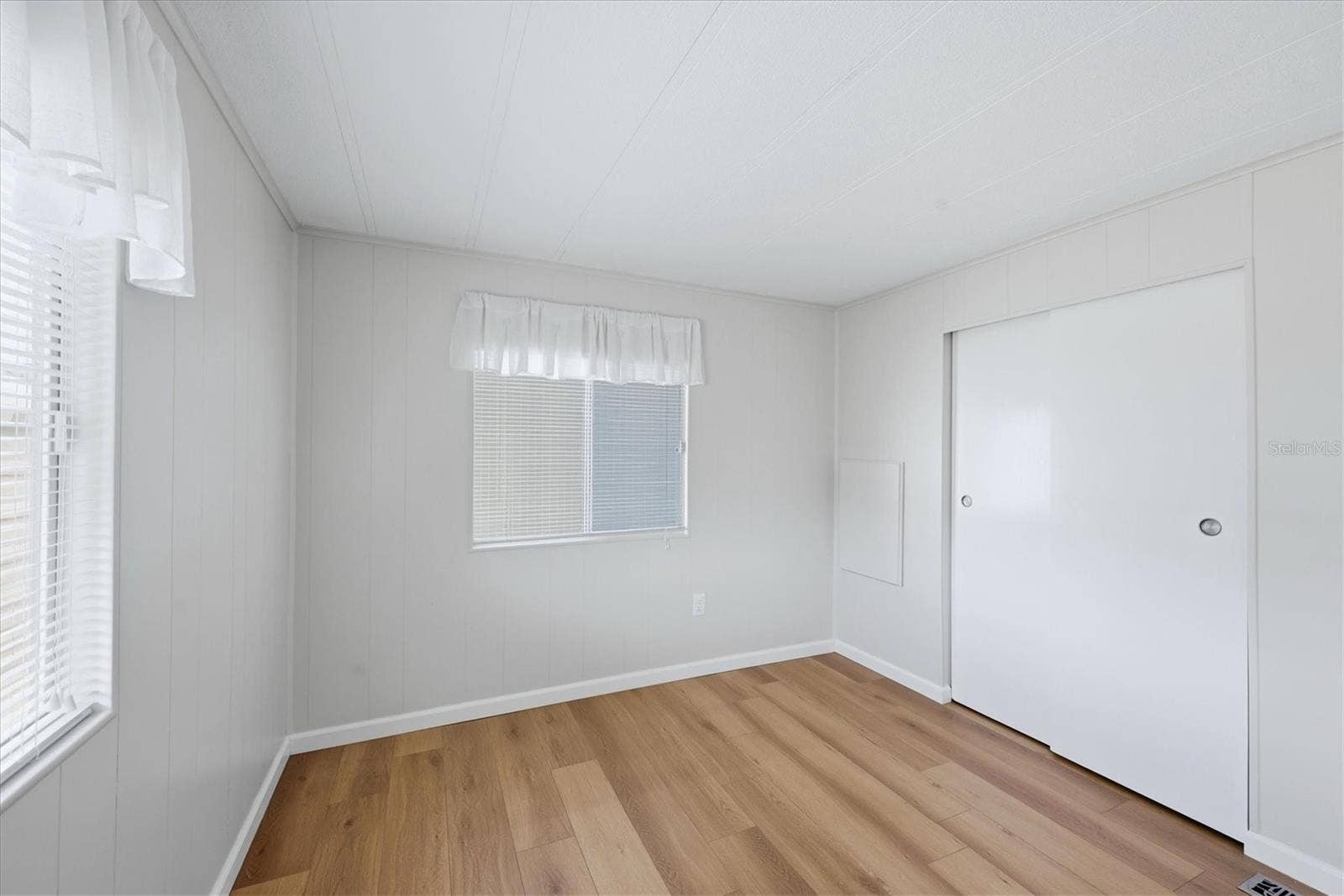 240 VIA DE LUNA, Englewood, FL 34224 Bedroom 2 with natural light & large closet