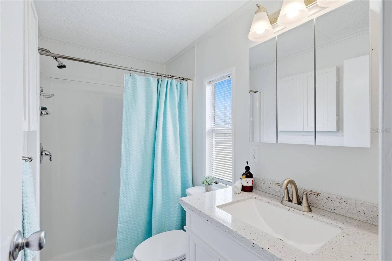 240 VIA DE LUNA, Englewood, FL 34224 En-suite with natural light and walk in shower