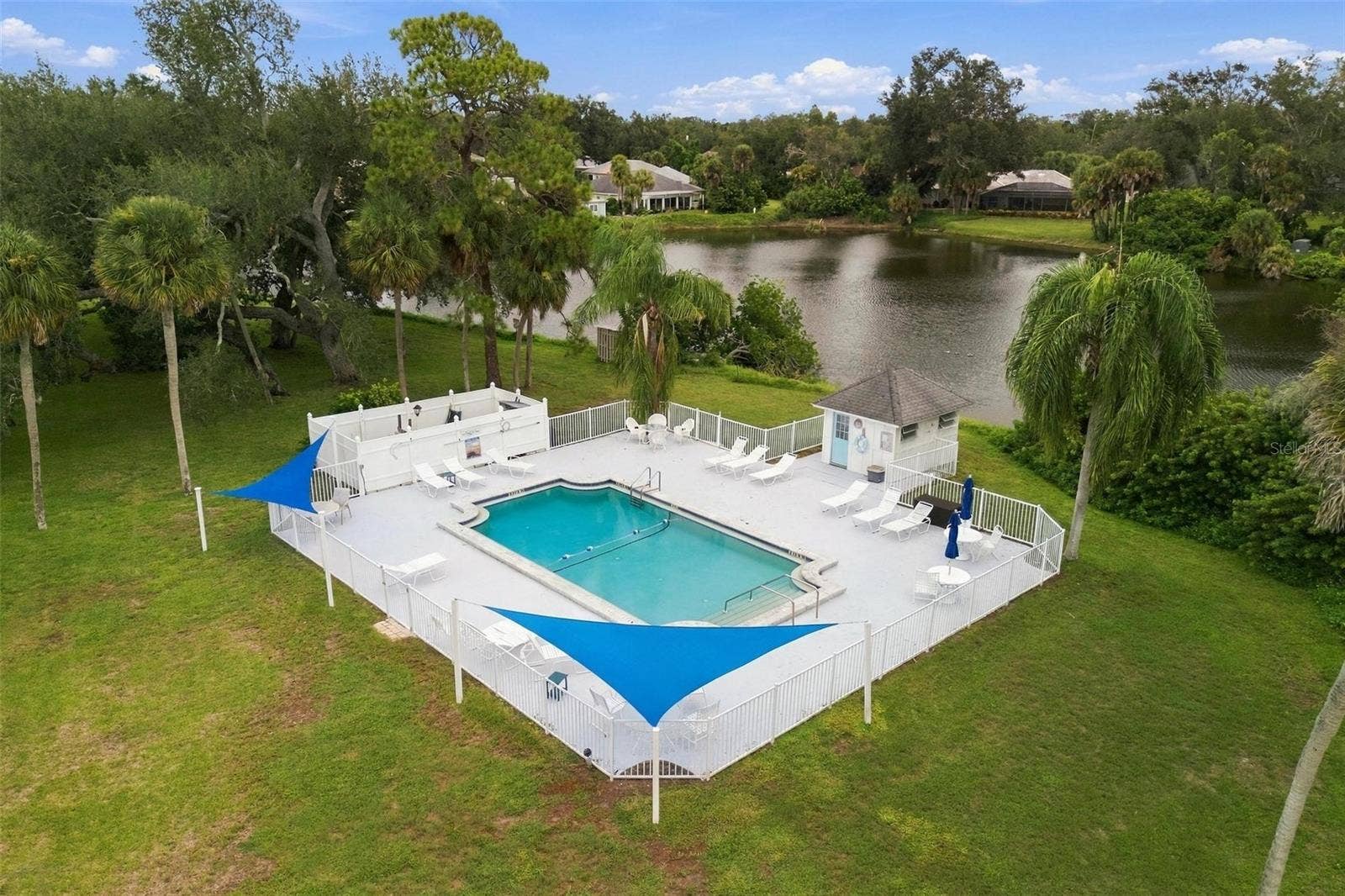 Neighborhood pool area and lake area