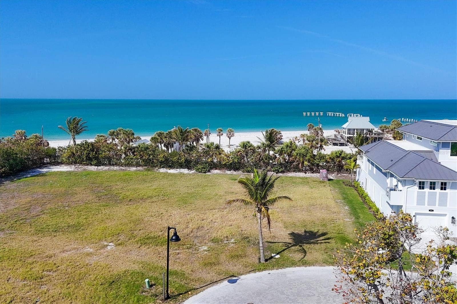 862 GRANDE PASS WAY, Boca Grande, FL 33921 Lot 4 - Hill Tide Estates. A rare opportunity to custom build your dream home with Gulf/Beach views WITHOUT the Gulf/Beachfront price!