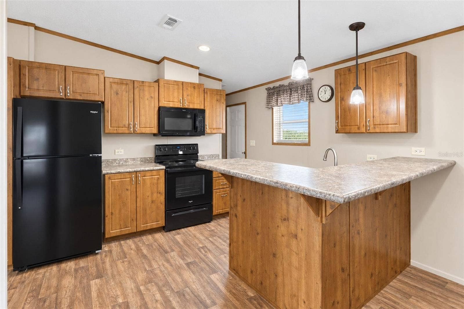 There's room for a couple of bar stools at the breakfast bar