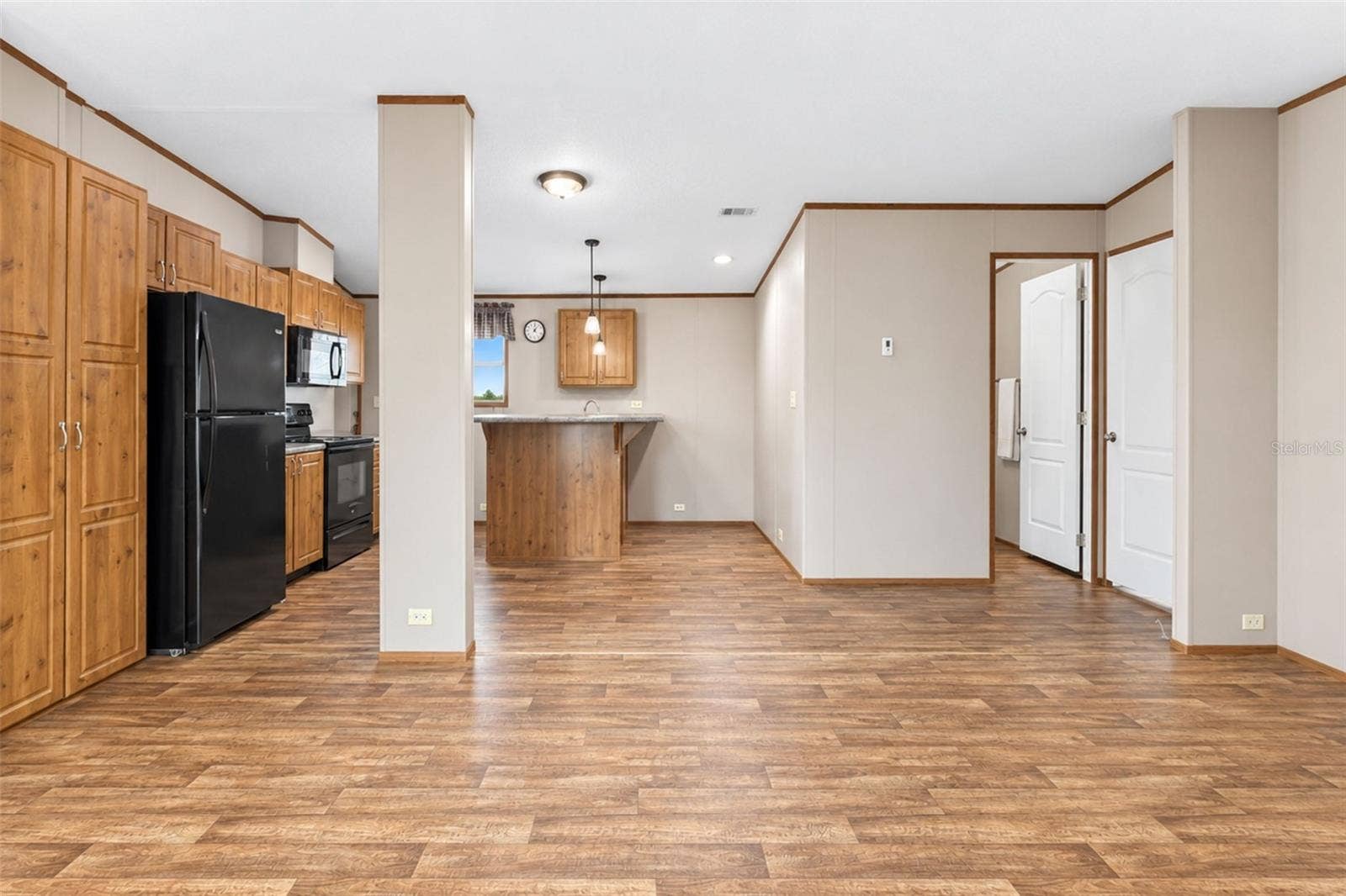 Looking toward kitchen from dining area