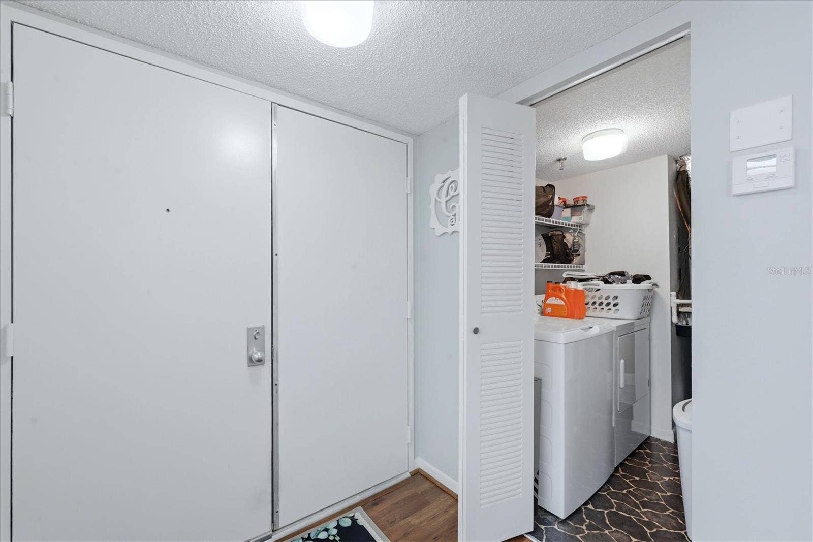 Laundry Room off Entry Way