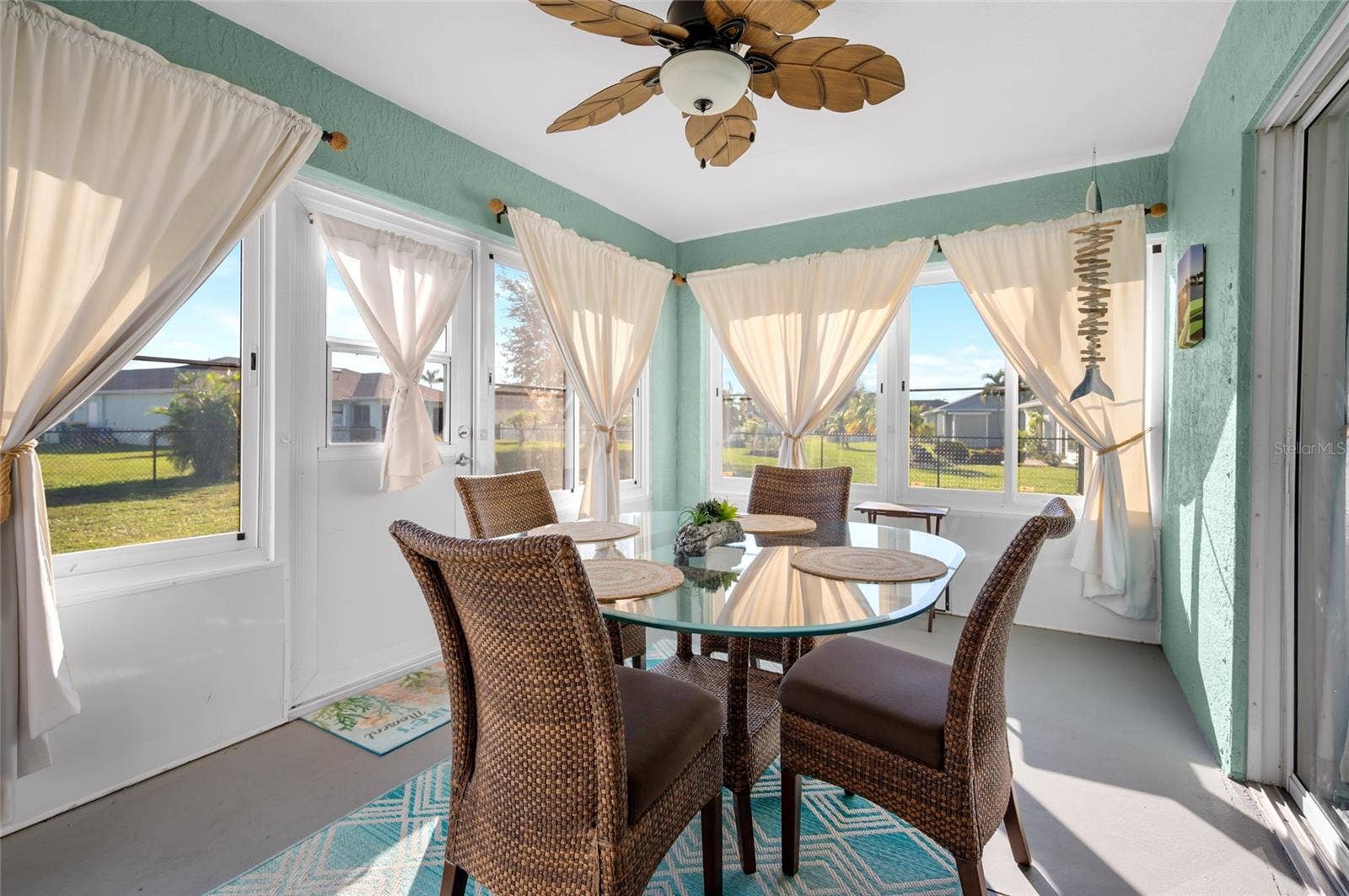6279 COLISEUM BOULEVARD, Port Charlotte, FL 33981 Enclosed, air conditioned florida room