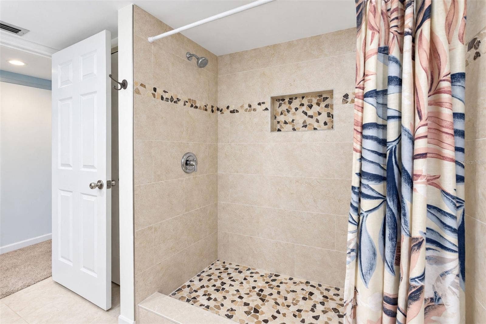 2950 N BEACH ROAD, #A321, Englewood, FL 34223 The primary bathroom features an updated shower.