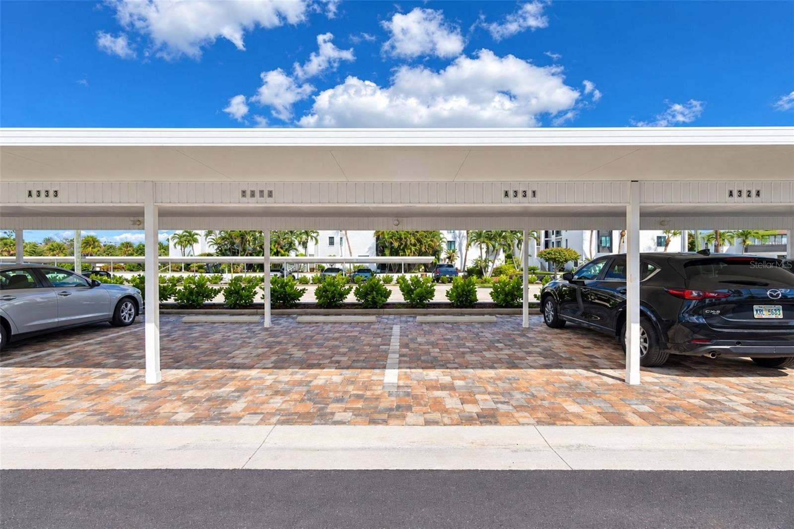 2950 N BEACH ROAD, #A321, Englewood, FL 34223 Covered & assigned parking is a bonus!