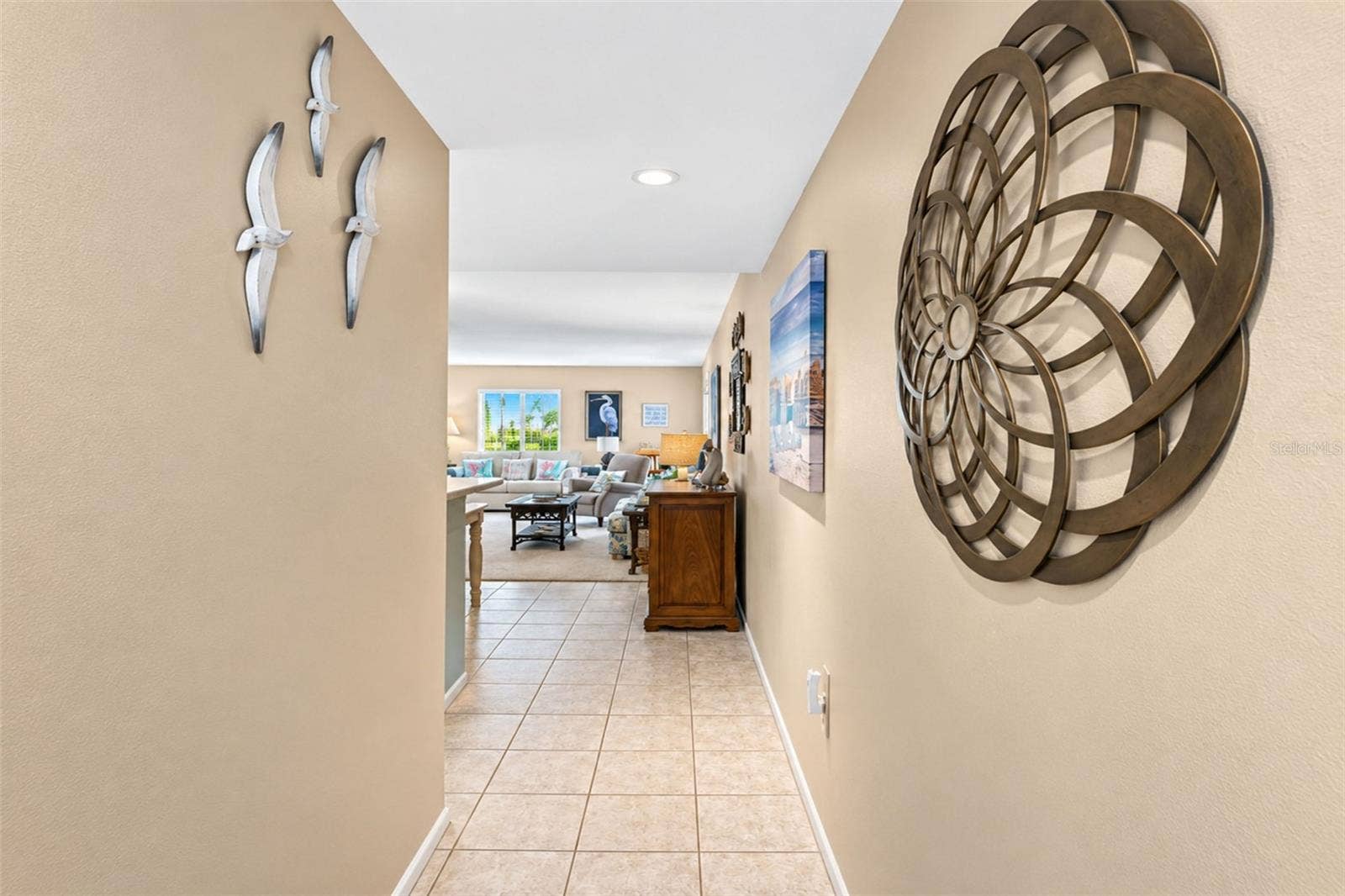2950 N BEACH ROAD, #A321, Englewood, FL 34223 The tiled flooring carries into the kitchen & dining area from the front entry.