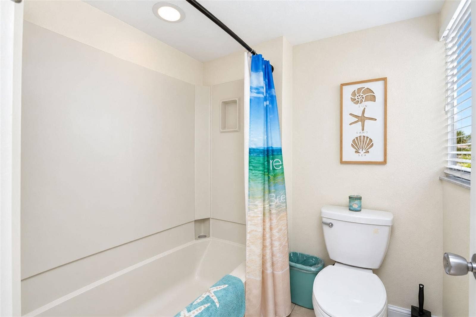 2950 N BEACH ROAD, #A321, Englewood, FL 34223 The guest bathroom has a tub/shower combo and a new toilet.