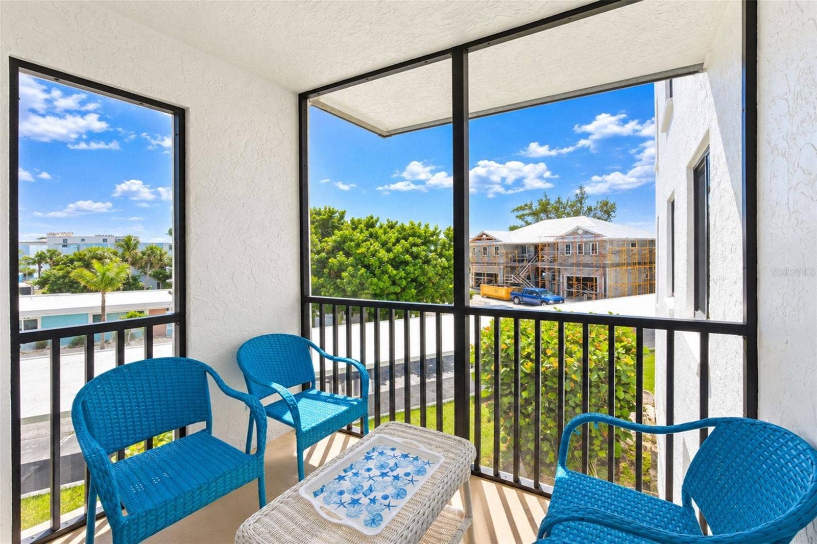 2950 N BEACH ROAD, #A321, Englewood, FL 34223 The screened lanai is a nice spot for morning coffee.