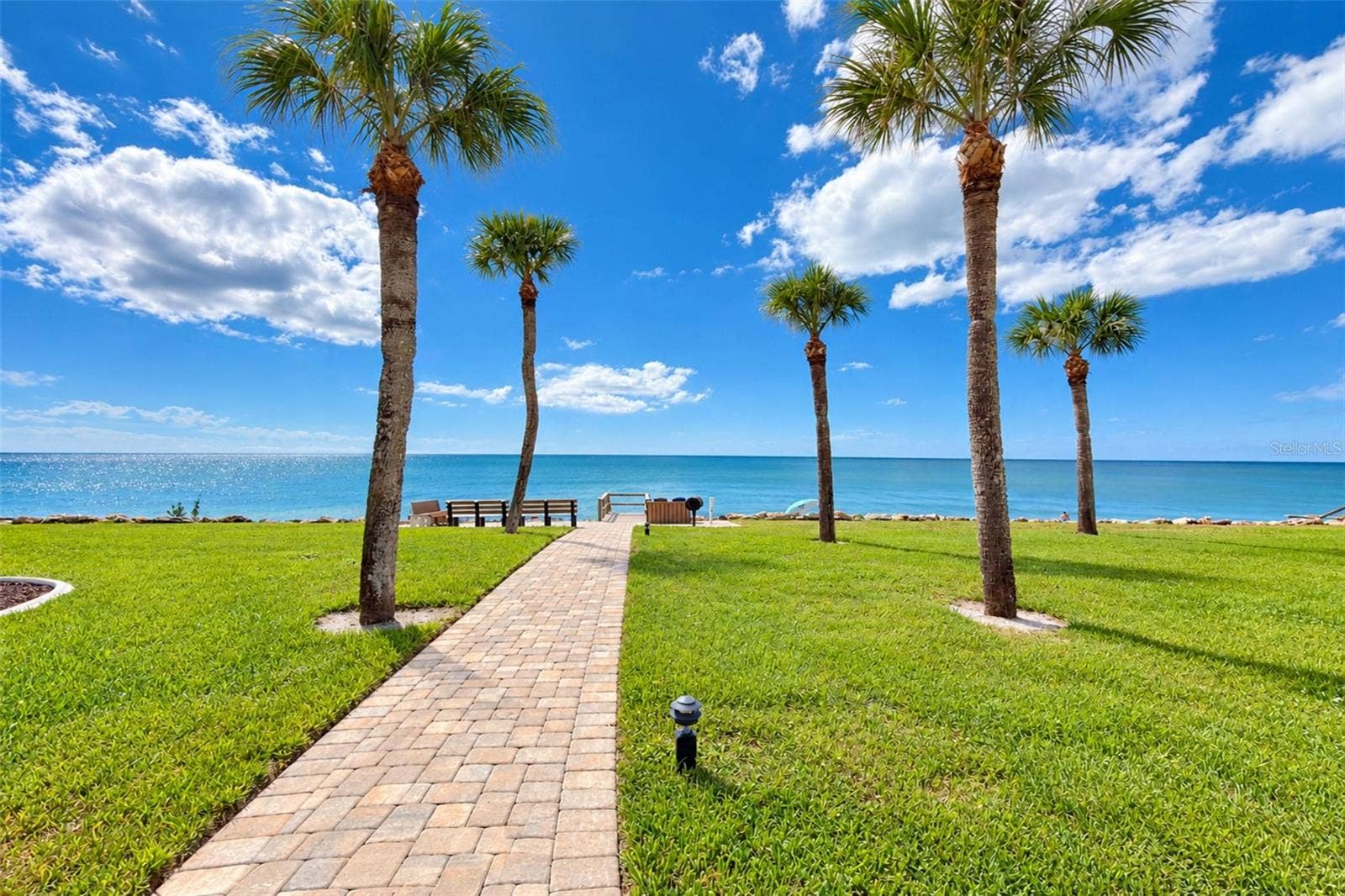 2950 N BEACH ROAD, #A321, Englewood, FL 34223 Walkway to the private beachfront seating area.