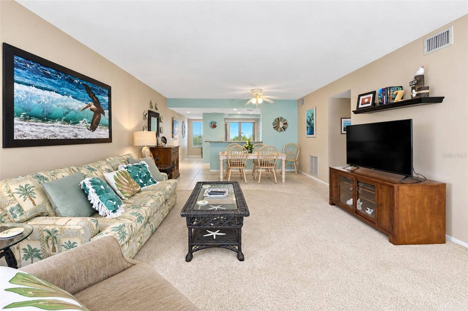 2950 N BEACH ROAD, #A321, Englewood, FL 34223 The view of the living & dining area from the lanai.