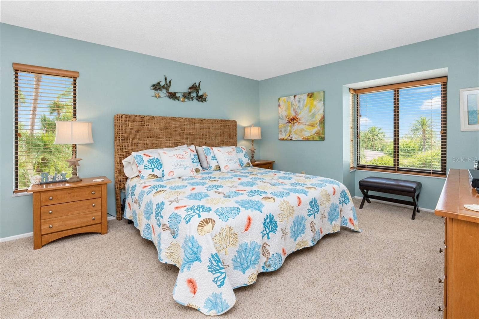 2950 N BEACH ROAD, #A321, Englewood, FL 34223 The primary bedroom features carpeted flooring and natural light.