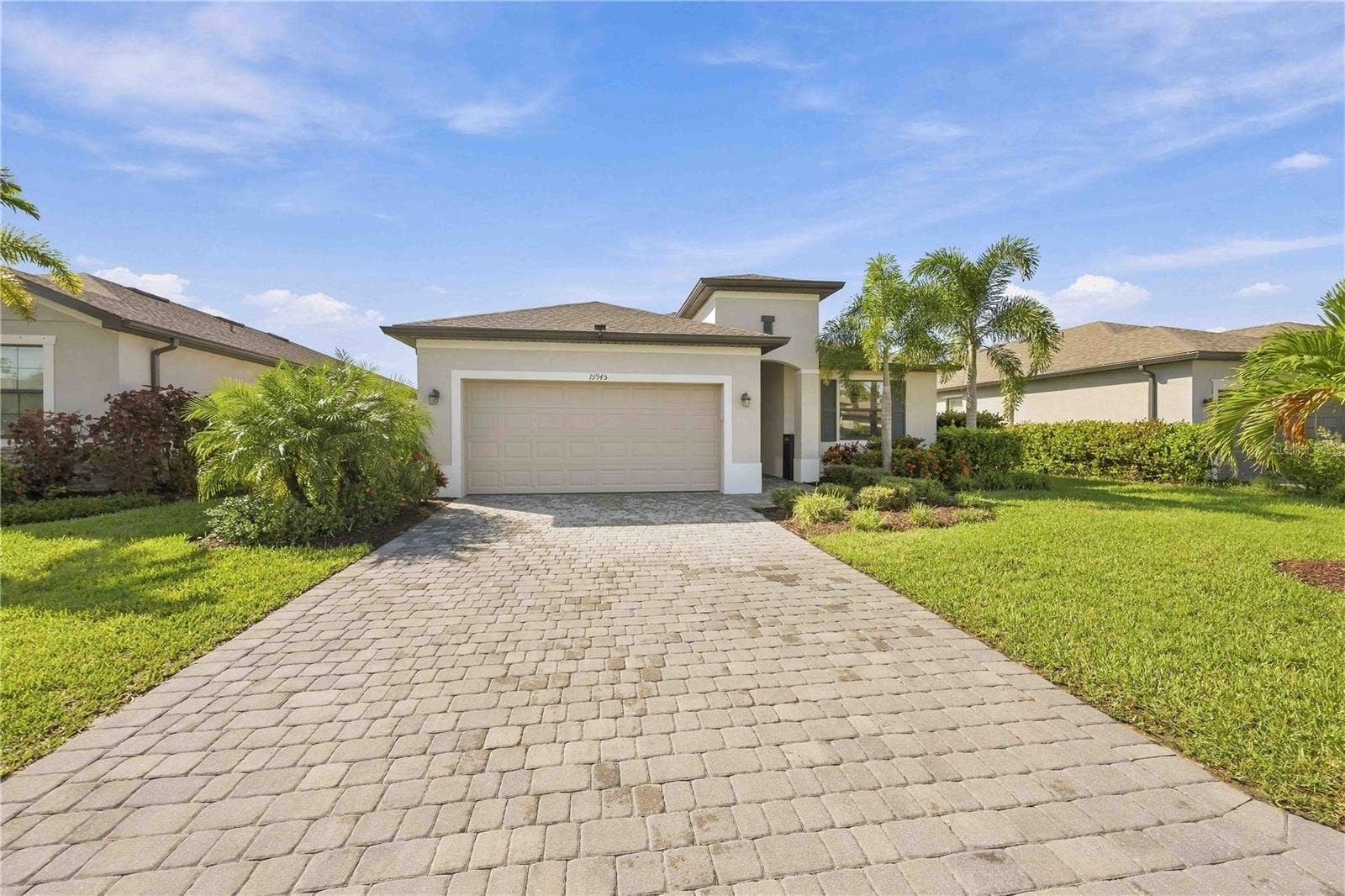 15945 HONEY SUCKLE STREET, Port Charlotte, FL 33953 Pavered driveway and lanai