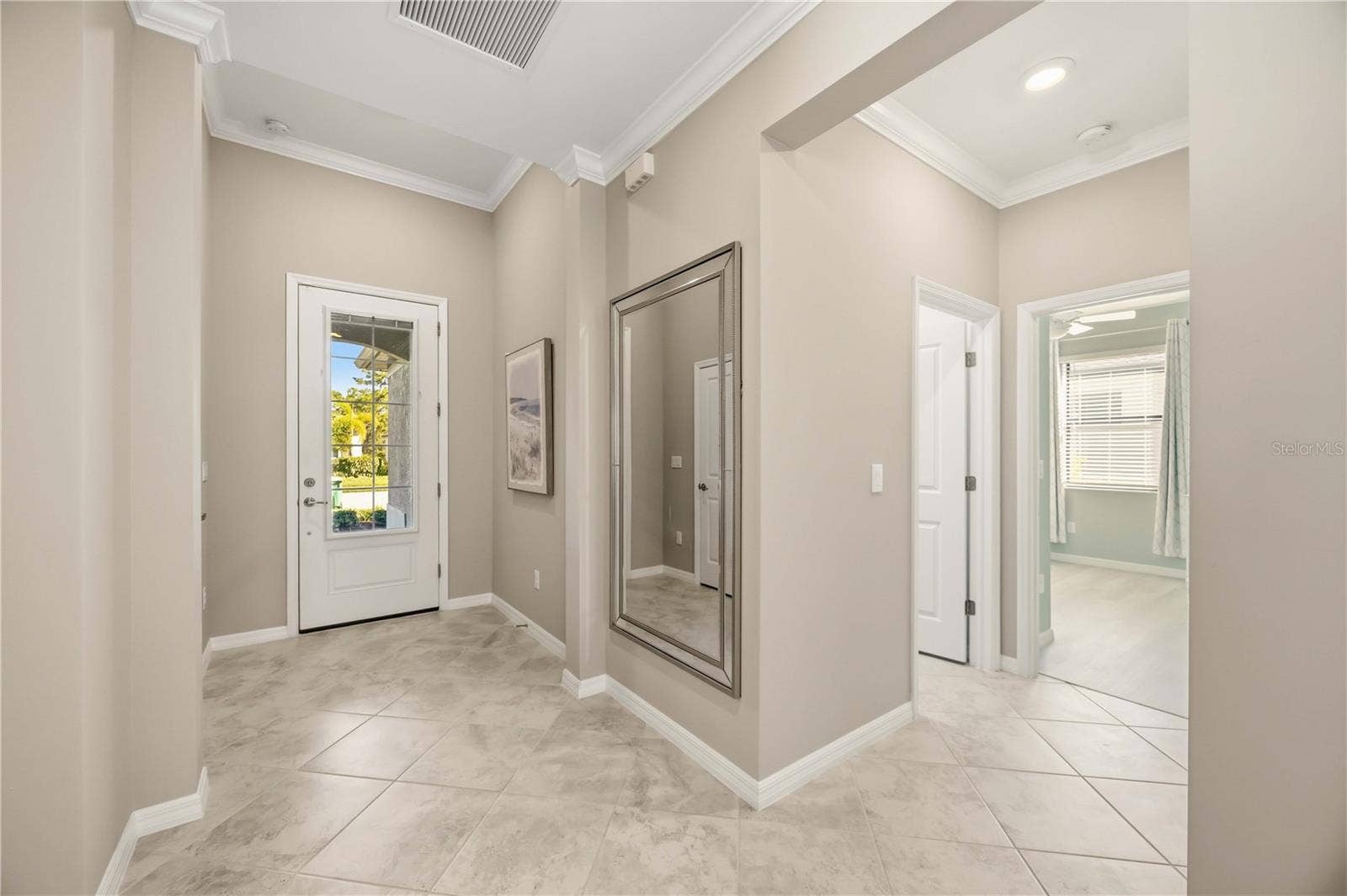 15945 HONEY SUCKLE STREET, Port Charlotte, FL 33953 Light and bright entryway