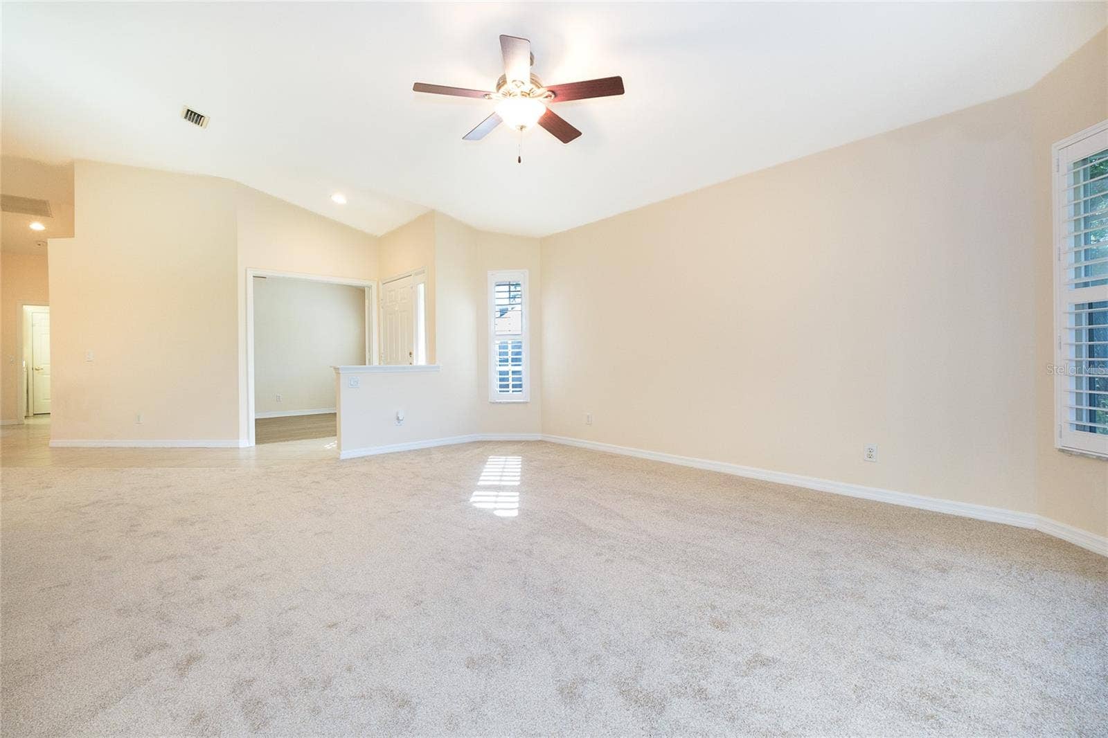 4057 FAIRWAY DRIVE, North Port, FL 34287 Spacious Living Room with New Carpet