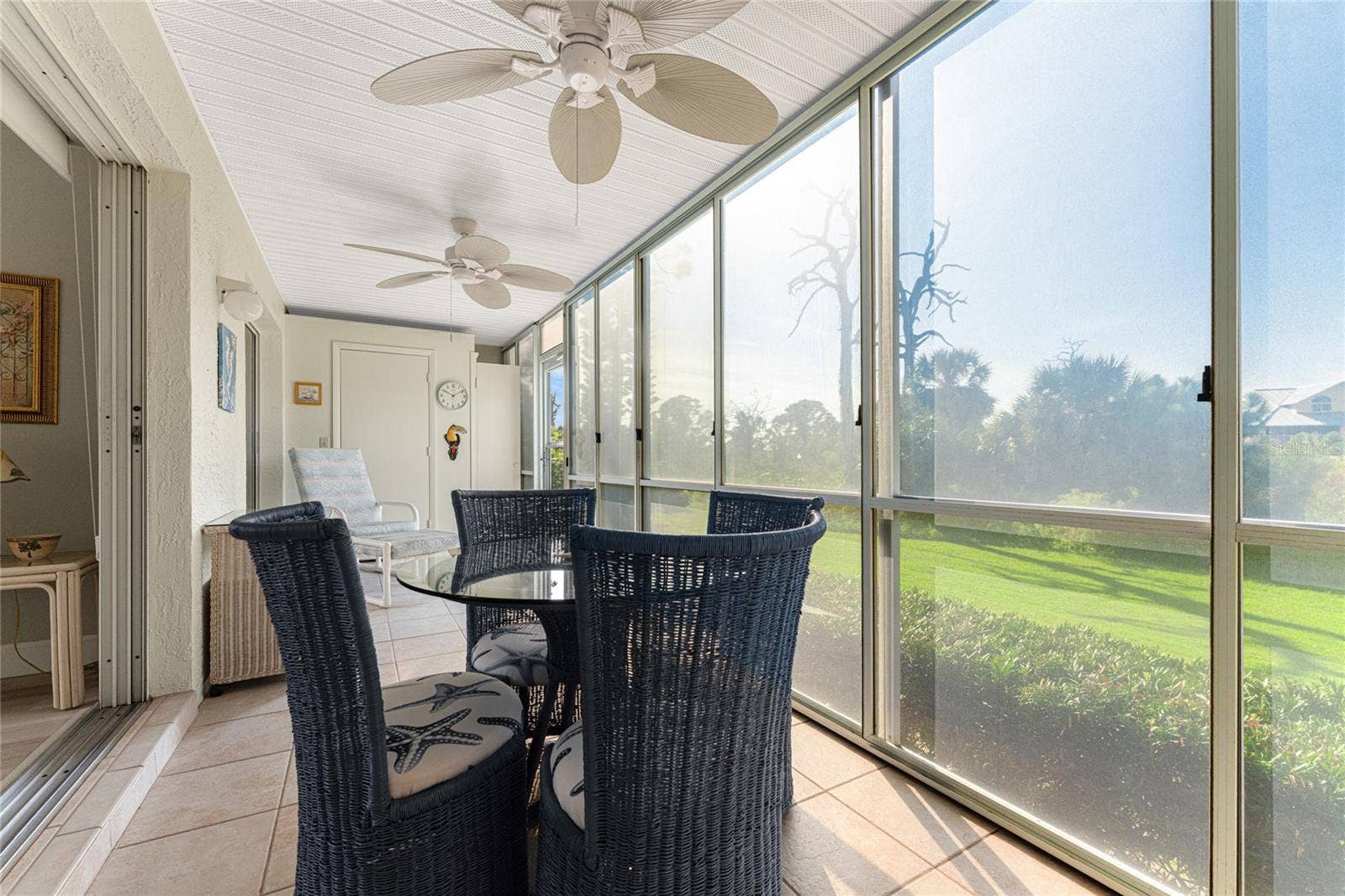 6600 GASPARILLA PINES BOULEVARD, #14-103, Englewood, FL 34224 Vinyl enclosed lanai overlooks Wildflower Preserve.