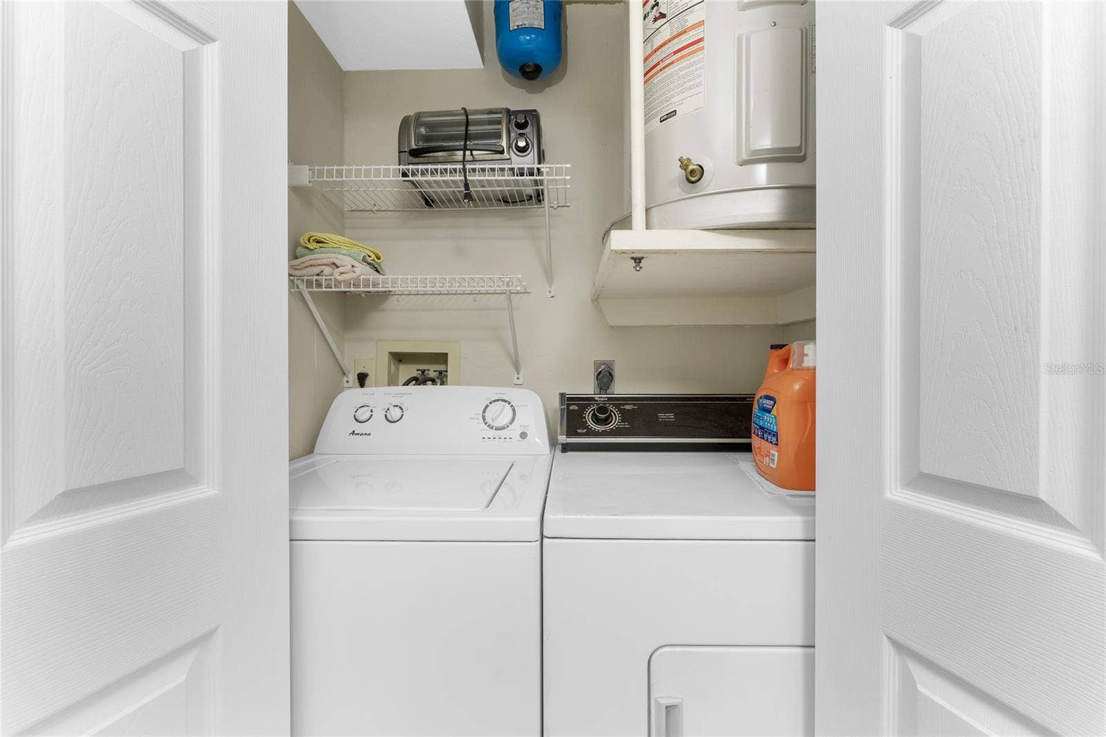 6600 GASPARILLA PINES BOULEVARD, #14-103, Englewood, FL 34224 Laundry closet fits a full size washer and dryer