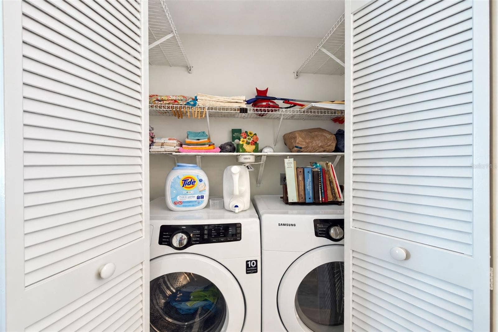 6468 HAMLET DRIVE, #B, Englewood, FL 34224 The inside laundry closet features a Samsung front load washer & dryer.