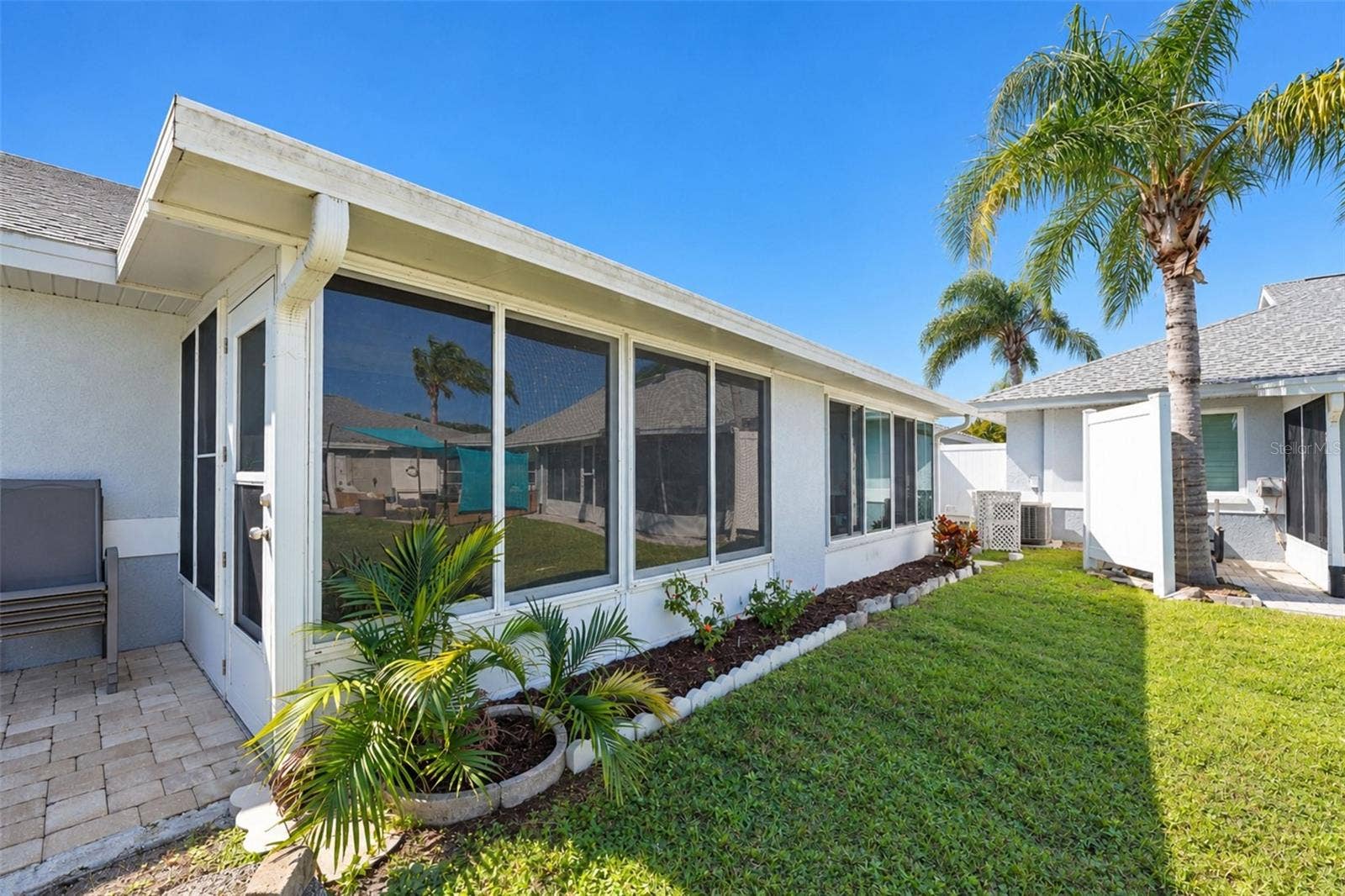 6468 HAMLET DRIVE, #B, Englewood, FL 34224 The GLASS-ENCLOSED Florida room is a great extension of your living space!