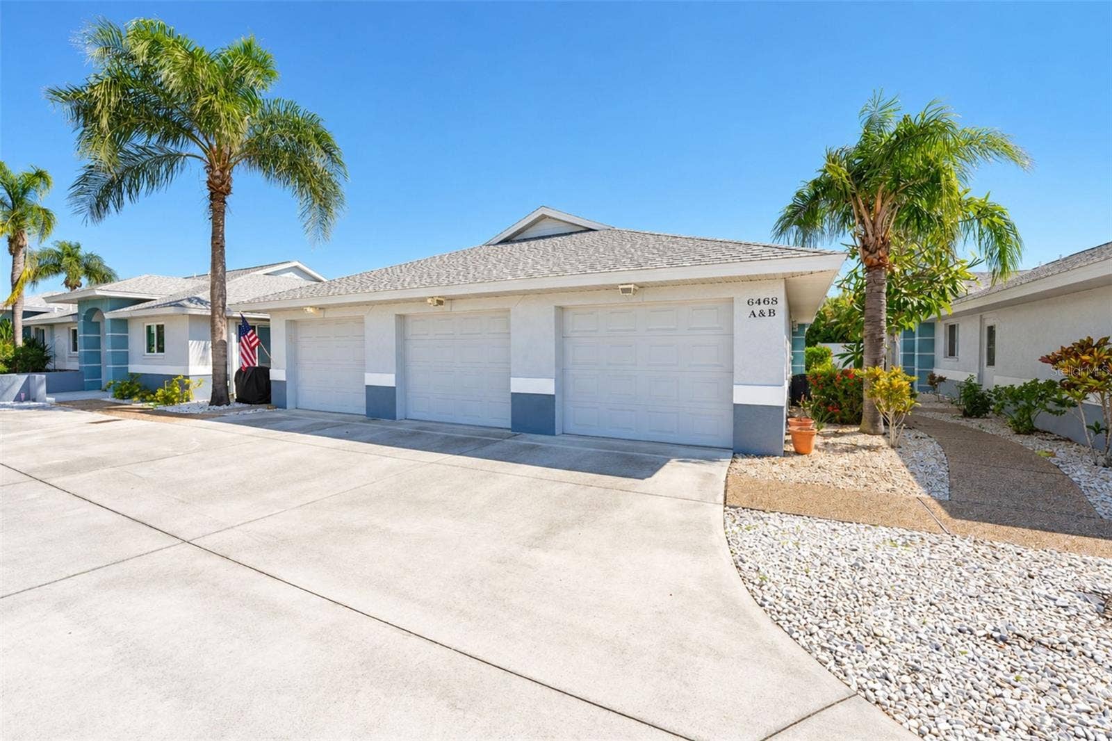 6468 HAMLET DRIVE, #B, Englewood, FL 34224 The walkway from the garage/parking area to your new condo!