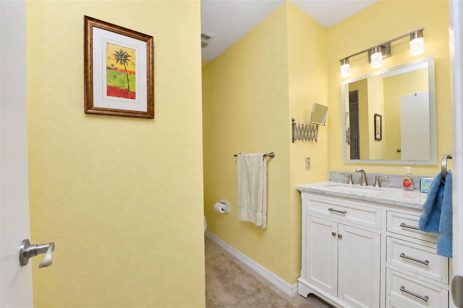 6468 HAMLET DRIVE, #B, Englewood, FL 34224 The guest bathroom has tiled flooring, new vanity with solid-surface countertop, new "touch" mirror, new lighting & many more updates!