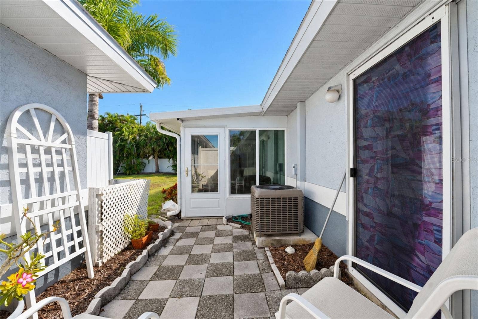 6468 HAMLET DRIVE, #B, Englewood, FL 34224 The rear patio has access from the primary bedroom and Florida room.