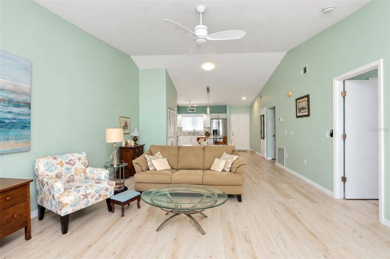 6468 HAMLET DRIVE, #B, Englewood, FL 34224 From the Florida room looking into the living/dining area and another view of the tubular skylight!
