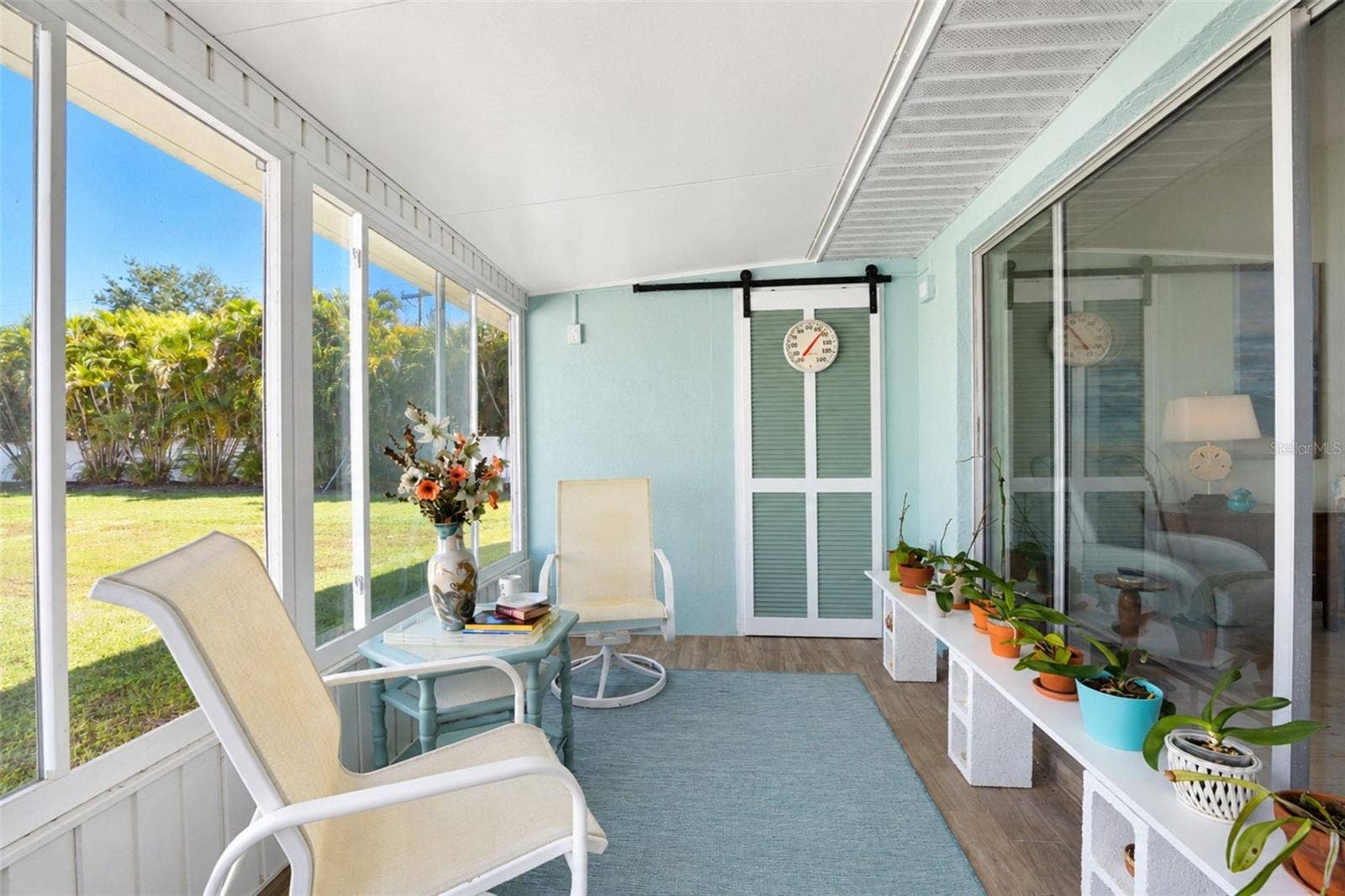 6468 HAMLET DRIVE, #B, Englewood, FL 34224 The GLASS-ENCLOSED Florida room lets you enjoy the outdoors no matter what the weather or temperature is!