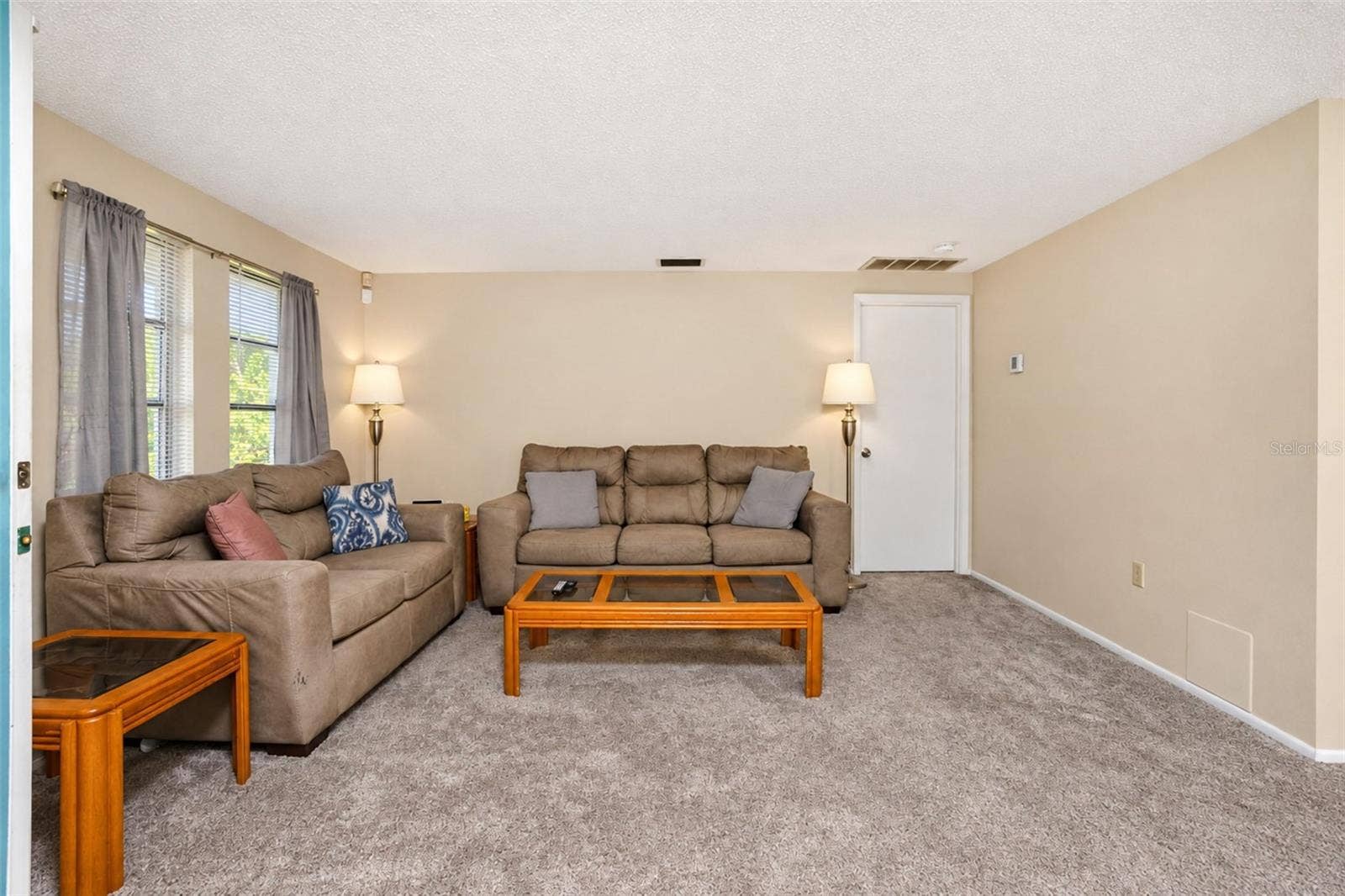 Living room leads to 2nd bedroom