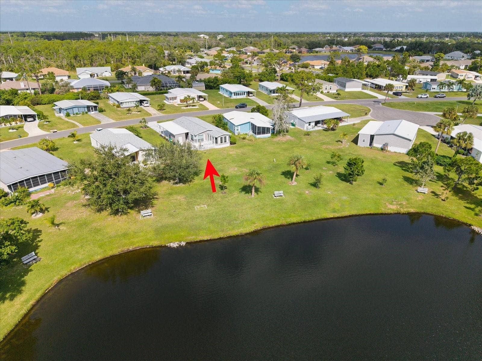 YOU OWN YOUR LOT WITH A LOW HOA FEE OF $200 A YEAR.