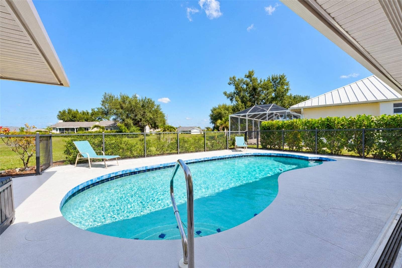 122 BUNKER ROAD, Rotonda West, FL 33947 Heated pool with golf course views
