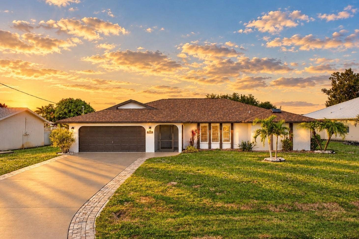 122 BUNKER ROAD, Rotonda West, FL 33947 Front exterior Virtually staged twilight effect