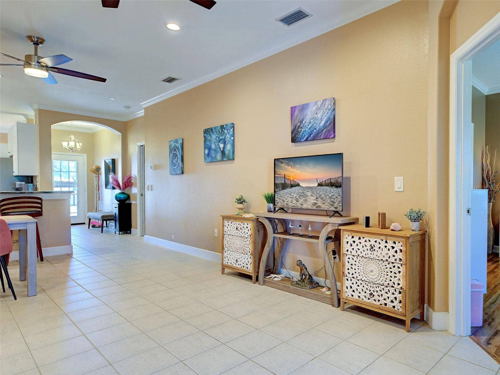 Looking towards front entry - great natural light.
