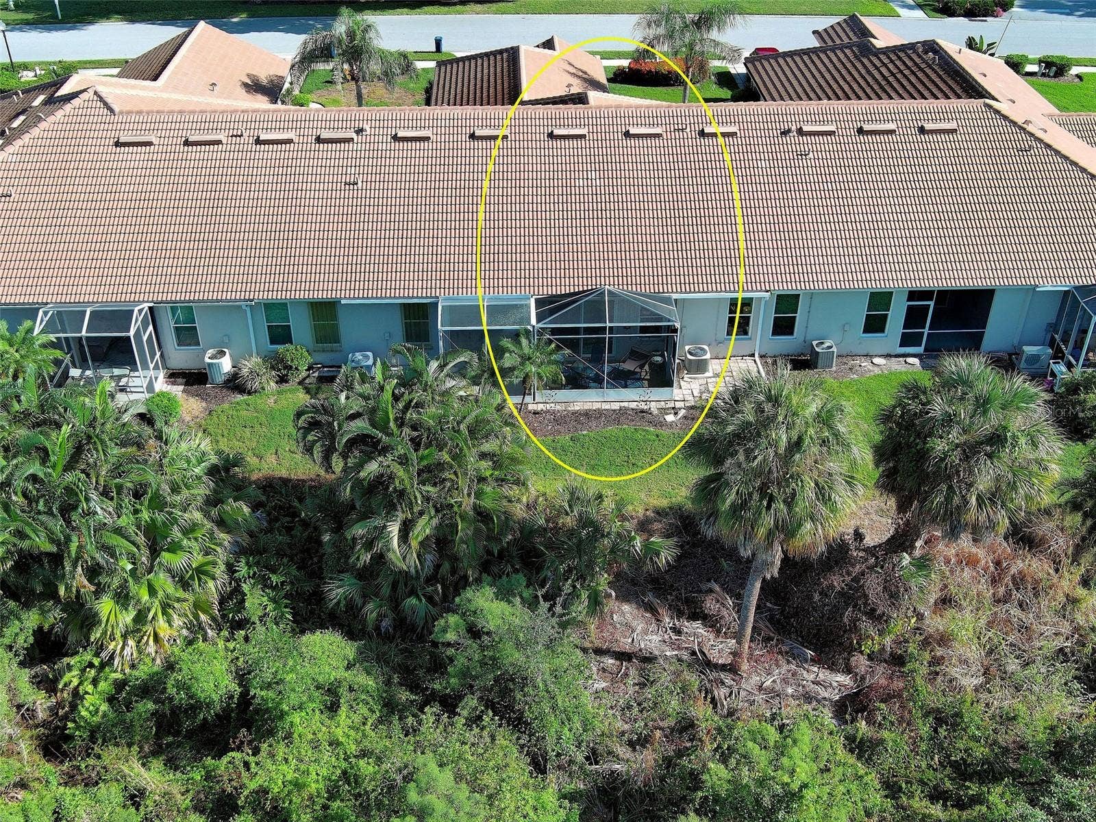 Aerial view of rear - this unit has a larger than most screened in lanai.