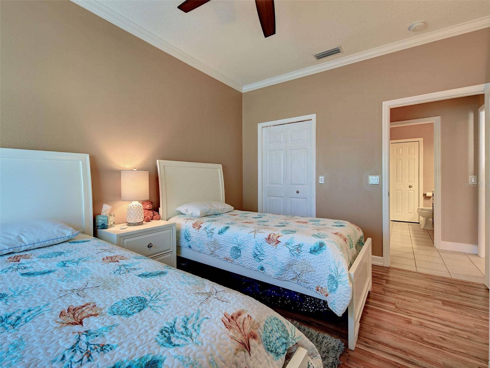 Guest Bedroom with private walk-in closet.