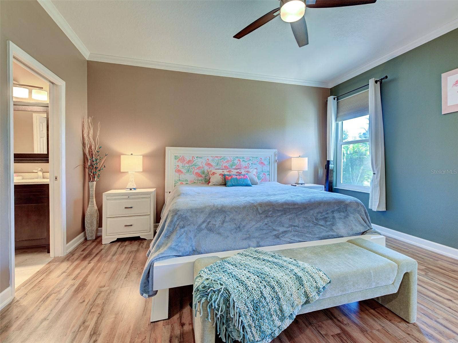 Roomy Primary Bedroom with huge walk-in closet and organizers.