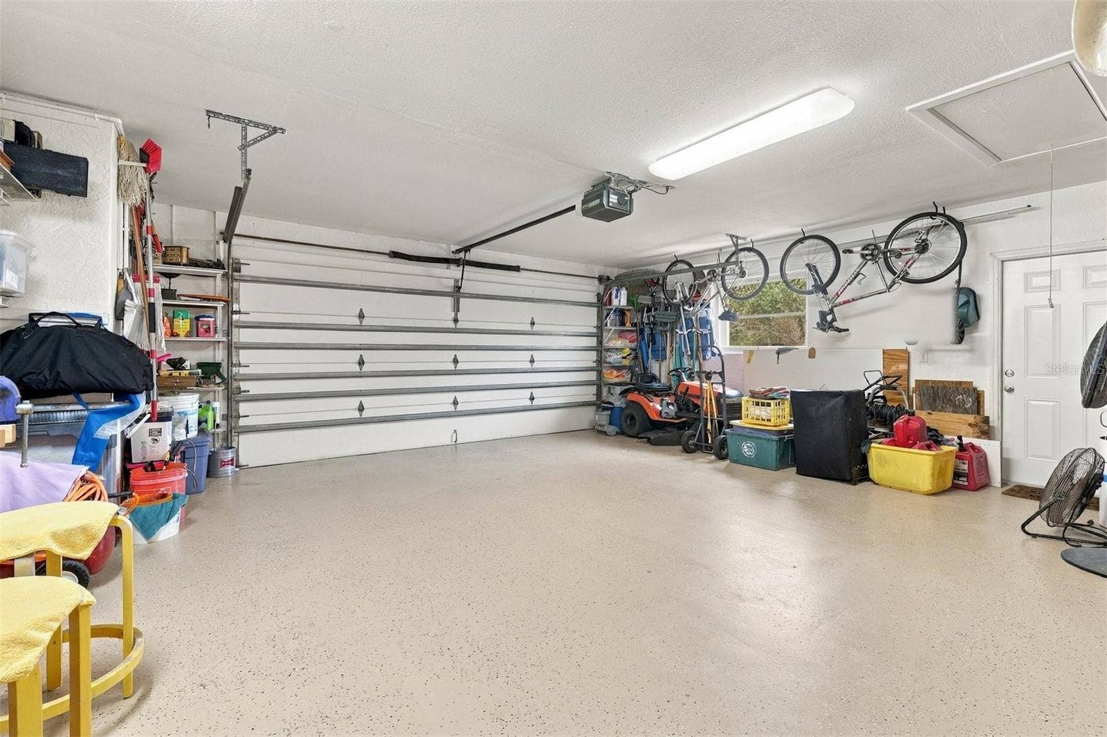 Oversize garage; new service door to outside