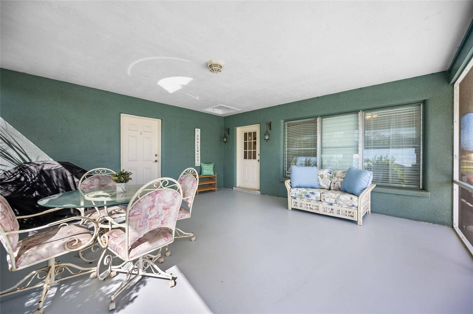 115 VIRGINIA COURT, Englewood, FL 34223 Front Screened and covered lanai