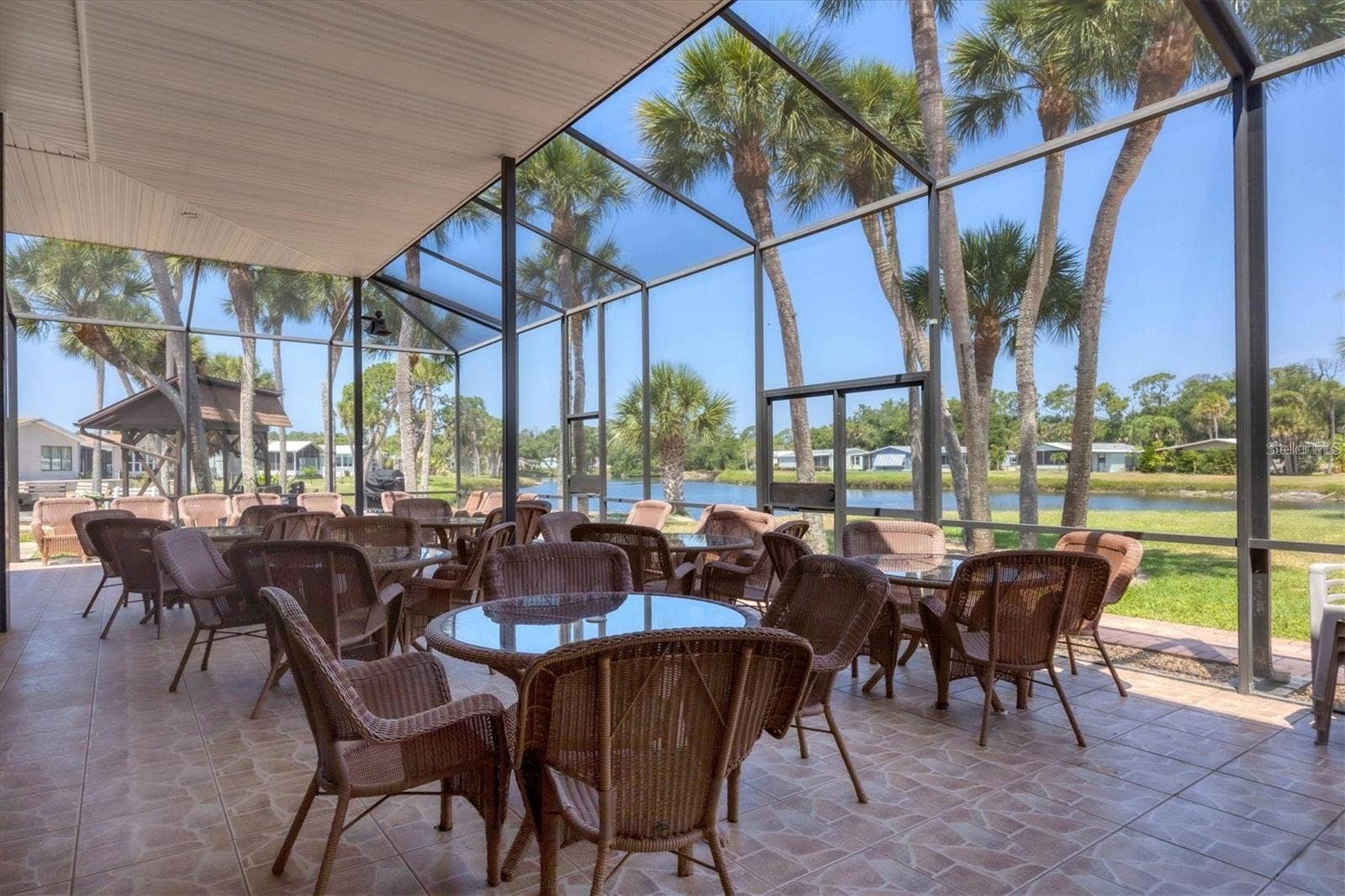 785 HEATHERCREEK COURT, Englewood, FL 34223 Clubhouse outdoor seating
