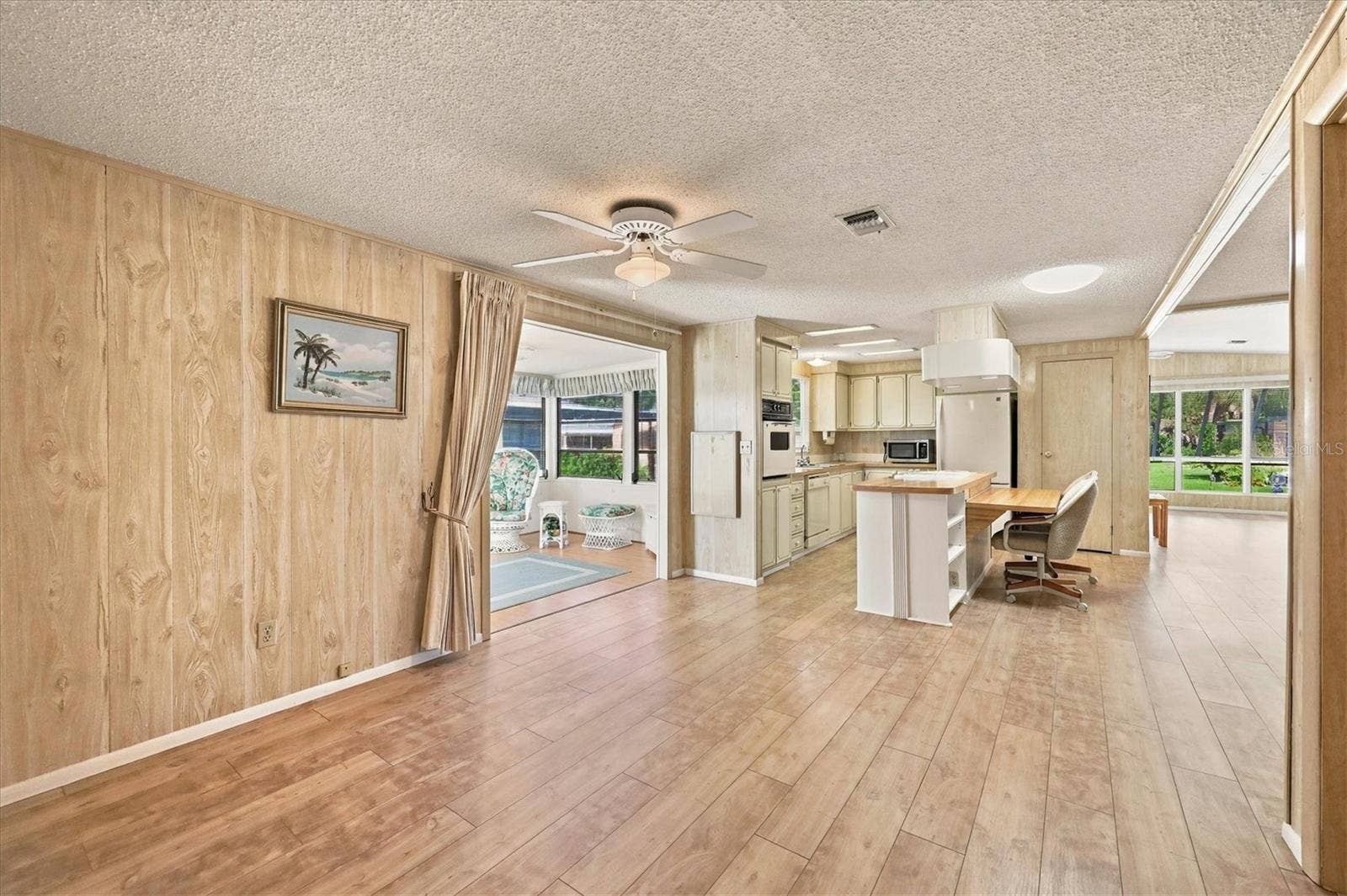 785 HEATHERCREEK COURT, Englewood, FL 34223 Family room off kitchen