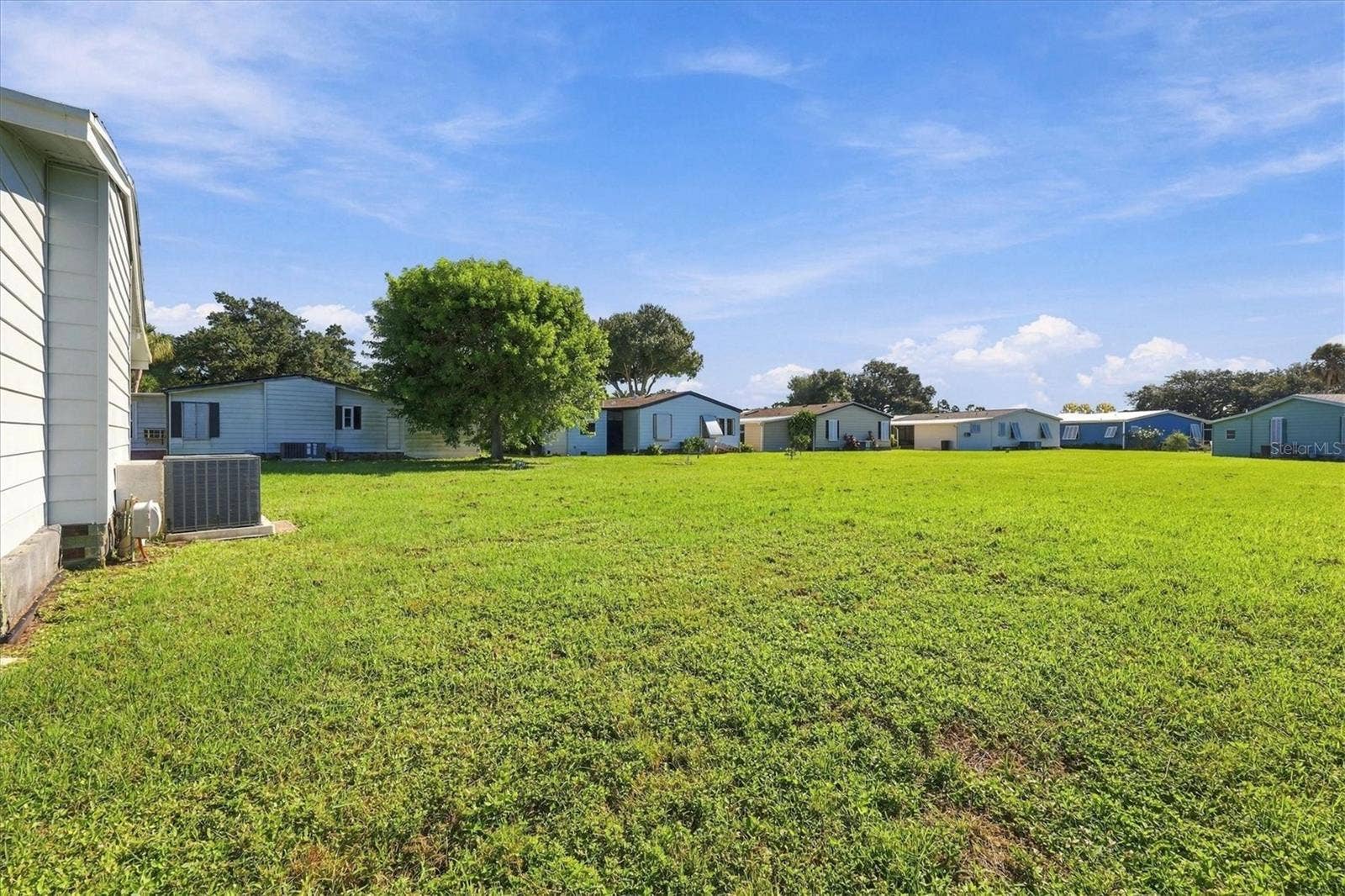 785 HEATHERCREEK COURT, Englewood, FL 34223 Open view from backyard