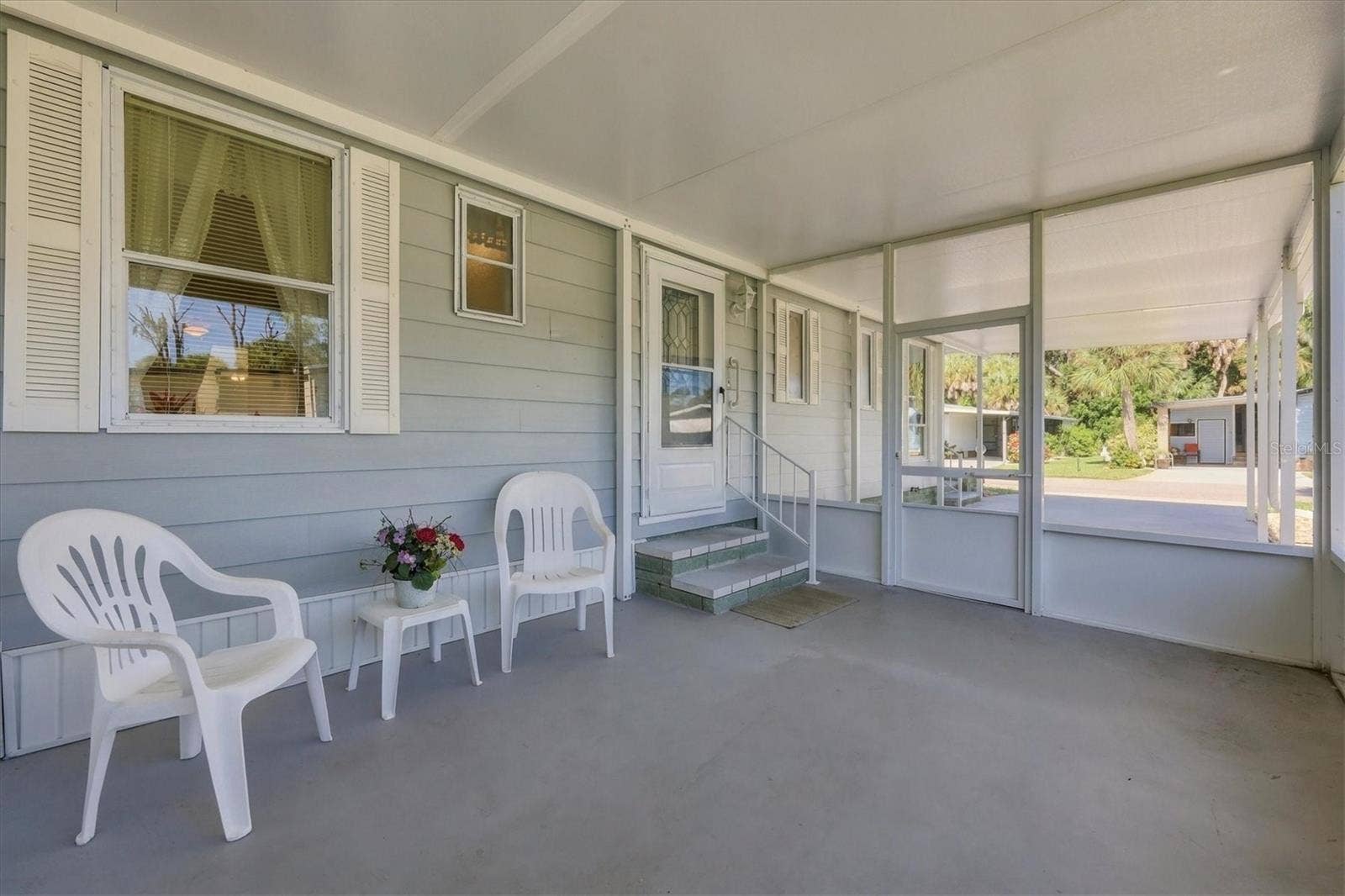 785 HEATHERCREEK COURT, Englewood, FL 34223 Relax in your screened porch