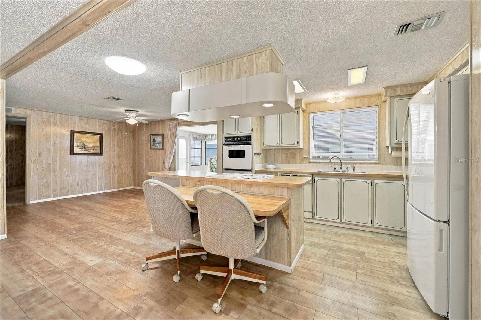 785 HEATHERCREEK COURT, Englewood, FL 34223 Eat-in kitchen w/sky light