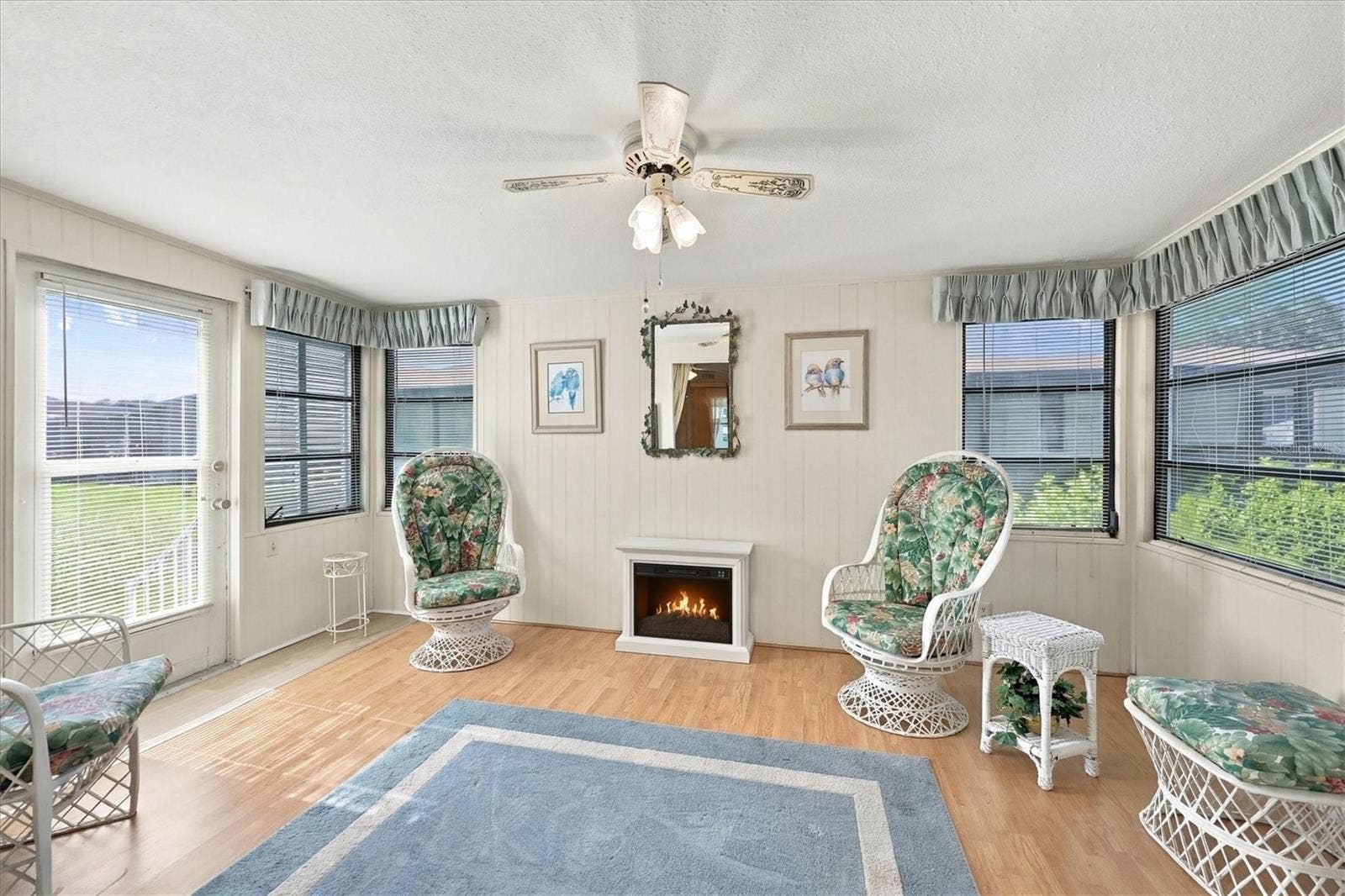 785 HEATHERCREEK COURT, Englewood, FL 34223 Florida room w/electric fireplace