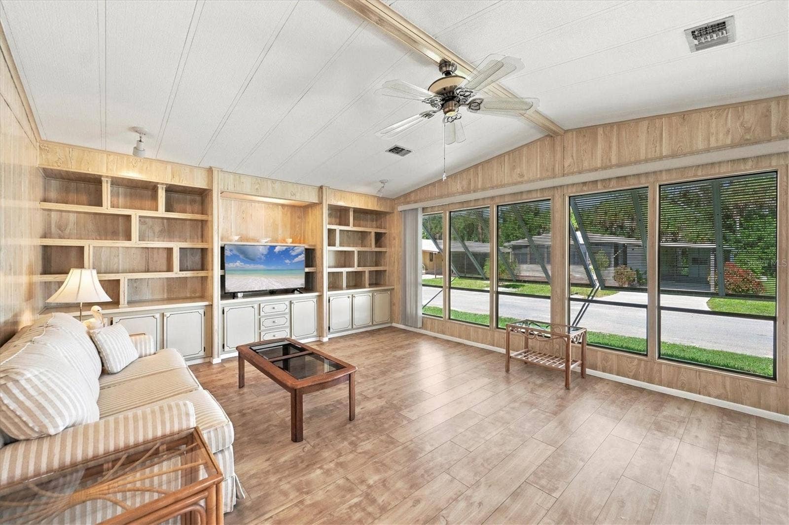 785 HEATHERCREEK COURT, Englewood, FL 34223 Living Room built-ins