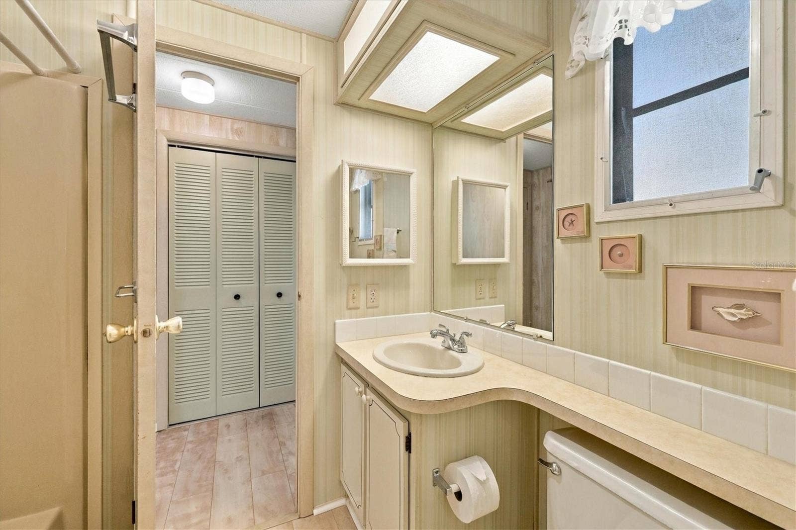 785 HEATHERCREEK COURT, Englewood, FL 34223 Guest bathroom w/tub & shower