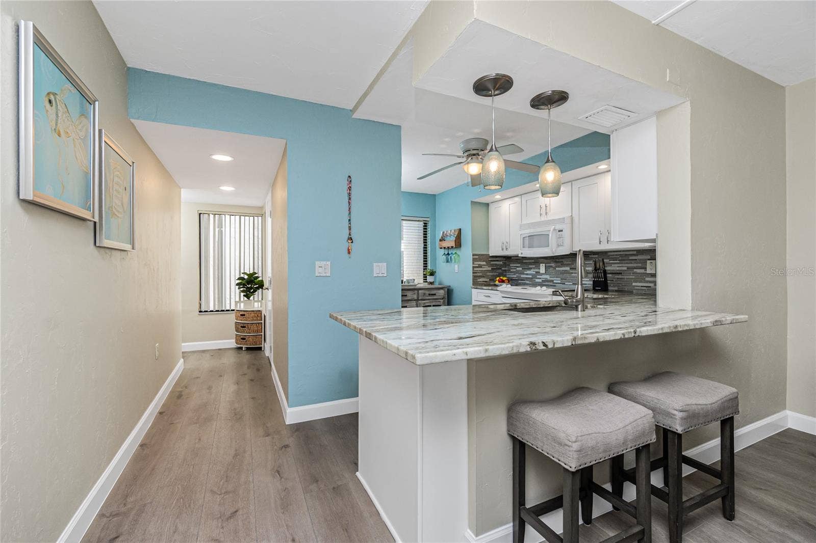 2955 N BEACH ROAD, #A411, Englewood, FL 34223 Looking Back to Entry and Into the Kitchen